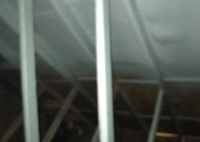 blurred shot of beam and ceiling insulated
